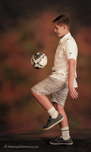 boy playing ball