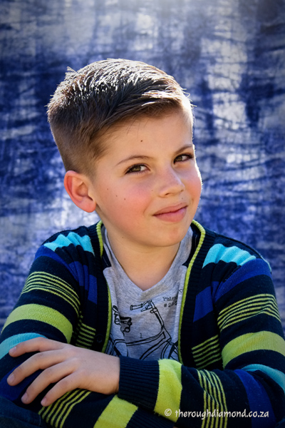 boy in striped jersey