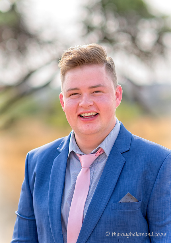 young man in blue suit